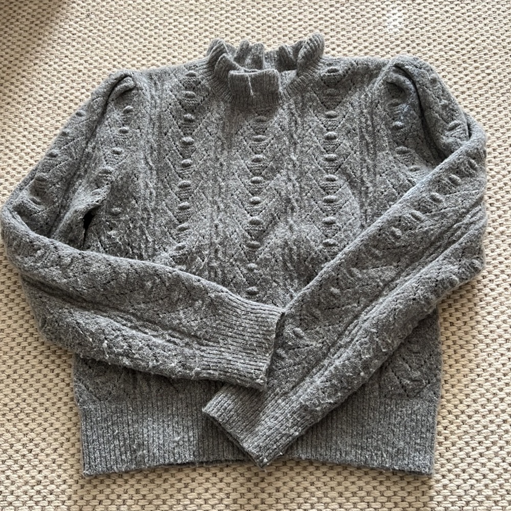 ASTRA the Label gray puff sleeve sweater with ruffle neck.